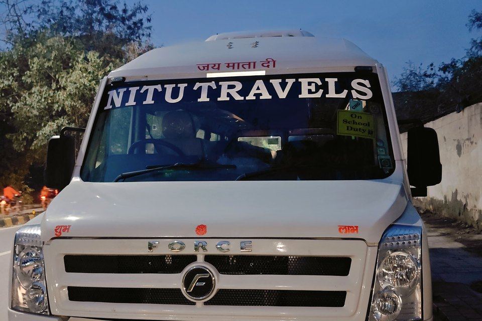 9 Seater Tempo Traveller rental